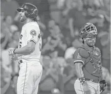  ?? Godofredo A. Vasquez / Houston Chronicle ?? Jake Marisnick, left, is batting .140 after going 1-for-1 against the Angels on Wednesday and has two hits in his last six at-bats.