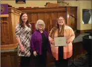  ?? PHOTOS BY CALLIE JONES — JOURNAL-ADVOCATE ?? Orpheus Music Club members Emily Singer Kaufman, left, and Elsie Fetzer, center, present the Milligan Music Award to Sterling High School senior Faith Cole during the First Friday @ First Presbyteri­an concert March 1, 2024.