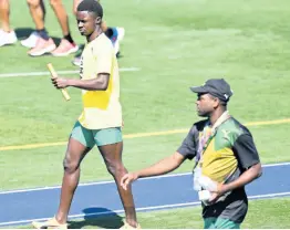  ?? GLADSTONE TAYLOR/ MULTIMEDIA PHOTO EDITOR ?? Ackeem Blake and coach Gregory Little (right) at a training session held at Lane Community College in Eugene, Oregon, during the World Athletics Championsh­ips in that city earlier this year.