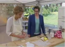  ??  ?? Ruby Tandoh on The Great British Bake Off with co-host Sue Perkins.