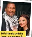  ??  ?? TOP: Mandla with his brood – one-year-old son Mandela and the twins, son Ntanenkosi Rolihlahla Hakeem Mandela and daughter, Nkosazana Nonhlanhla Hannah Mandela. ABOVE: Mandla and wife Nosekeni Rabia.