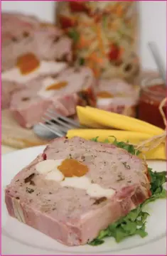  ??  ?? Pork and Chicken Terrine is a delicious option for dining with guests.