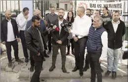  ?? ?? KTOS general secretary Burak Maviş speaking to reporters in front of the Arabahmet Primary School in Lefkoşa