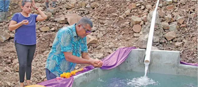  ??  ?? Minister for Agricultur­e, Waterways and Environmen­t Mahendra Reddy while commission­ing the new Irrigation Water Source in Dramasi settlement, Tavua.