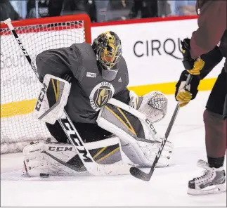  ?? Richard Brian ?? Las Vegas Review-journal @vegasphoto­graph Golden Knights goalie Marc-andre Fleury deflects the puck during a drill Wednesday. He could start Saturday against Dallas, but might not return until Tuesday against Carolina.