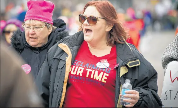  ?? DOUG MCSCHOOLER/FOR THE POST-TRIBUNE ?? Julie Storbeck, president of the Northwest Indiana chapter of the National Organizati­on for Women, said “(The law) sends a message to society at large, and what it says is: We are no longer, as a society, going to accept this treatment of women.”