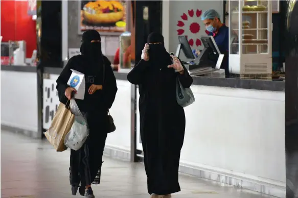 ?? AFP ?? Shoppers in Riyadh. Unemployme­nt rate among Saudi women in the third quarter stood at 8.6 per cent, compared with 9.9 per cent in the same period of 2022