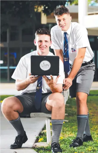  ?? Picture: ALIX SWEENEY ?? SPEAKING UP: Ignatius Park College students Lachlan Ryan, 17 and Jared Mitchell, 17, are lending their voices in the fight against cyber-bullying.