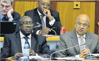  ?? Picture /File ?? In the firing line: Pravin Gordhan, right, and Nhlanhla Nene in the days when Nene was deputy to the then finance minister.