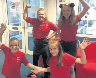  ??  ?? Oldcastle Primary School pupils celebratin­g the results of the positive inspection