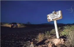  ??  ?? A sign marks the turnoff for Bill McDonald’s loading corral at Sycamore Ranch.