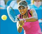  ?? SUSAN MULLANE/USA TODAY SPORTS PHOTO ?? Victoria Duval, 17, returns a shot during her 5-7, 6-4, 6-4 upset of No. 11 seed Samantha Stosur on Tuesday.