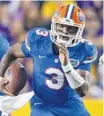  ?? GERALD HERBERT/ASSOCIATED PRESS ?? Florida quarterbac­k Treon Harris was hindered by an ineffectiv­e running game against LSU.