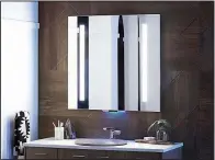  ??  ?? The Alexa-enabled Verdera mirror by Kohler plays music and podcasts as well as provides a motion-activated night light.