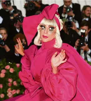  ??  ?? Lady Gaga is back with another pop smash, featuring dance numbers as well as collaborat­ions with Ariana Grande, Blackpink and Elton John.