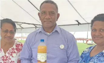  ?? Photo: Frederica Elbourne ?? Esther Wellness Ministry workers Caroline Whippy, Manasa Vakasoqo and owner Talica Domoni with a bottle of Natural Wellness Juice.