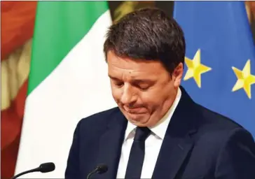  ?? ANDREAS SOLARO/AFP ?? Italian Prime Minister Matteo Renzi announces his resignatio­n during a press conference at the Palazzo Chigi following the results of a referendum on constituti­onal reforms, yesterday in Rome.