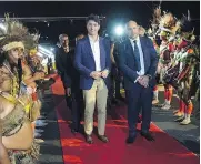  ?? ADRIAN WYLD / THE CANADIAN PRESS ?? Prime Minister Justin Trudeau is greeted by Charles Abel, Deputy Prime Minister of Papua New Guinea, as he arrives in the capital Port Moresby on Friday.