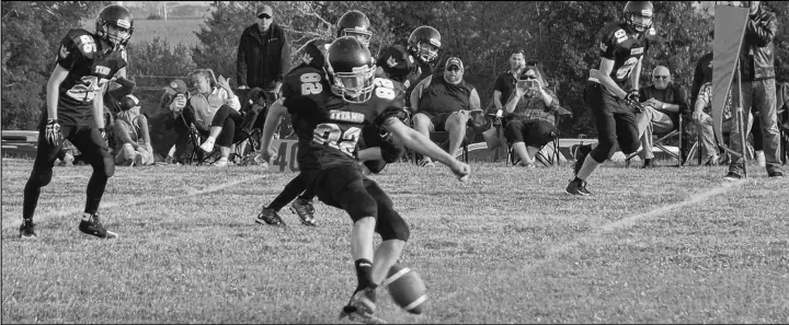  ?? Kirk starratt ?? Thomas Bolland of the NKEC Titans makes a kick during the game against the West Kings Wolverines.