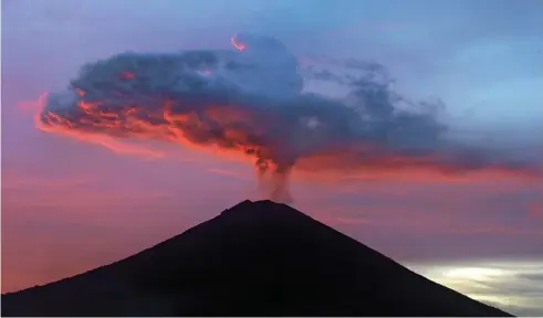  ?? Picture / AP ?? Mount Agung has caused major disruption­s to flights in and out of Bali this week.