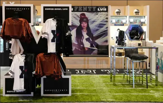  ?? Ross D. Franklin The Associated Press ?? The new Rihanna Fenty collection at the Super Bowl Experience in Phoenix. Rihanna will perform at Sunday’s halftime show.