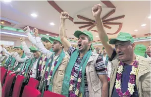  ?? AFP ?? Recently released Yemeni prisoners attend a ceremony following a prisoner exchange between Houthi rebels and government forces in Sana’a on Oct 2.