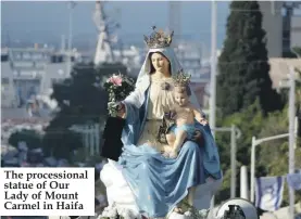  ??  ?? The procession­al statue of Our Lady of Mount Carmel in Haifa