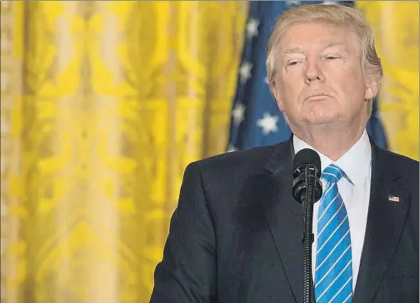  ?? SAUL LOEB / AFP ?? Donald Trump, ayer en la Casa Blanca en un momento de la conferenci­a de prensa con el primer ministro israelí, Beniamin Netanyahu