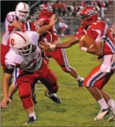  ?? Photos courtesy J.S. Garber ?? Neshaminy senior Justin Andrews caught a 46-yard TD pass in the second quarter that put the Redskins on top of Truman, 14-0.