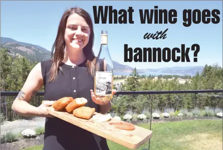  ?? STEVE MacNAULL/The Okanagan Weekend ?? Server Nicole Pelletier arrives with bannock and Indigenous World Winery Pinot Gris at the winery’s Red Fox Club restaurant.