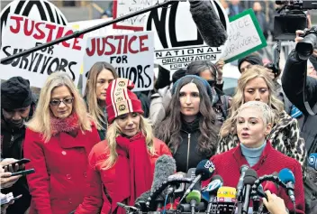  ??  ?? Traumatic legacy: actors Rose Mcgowan, right, and Rosanna Arquette, centre left, ahead of Harvey Weinstein’s trial in New York