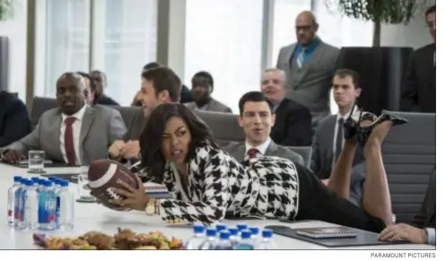  ?? PARAMOUNT PICTURES ?? Taraji P. Henson’s Ali thought she’d earned a promotion at work in an early scene in “What Men Want,” but the football representi­ng the partnershi­p position was meant for a male colleague sitting farther down the table.