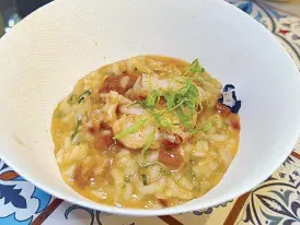  ??  ?? Michelin-starred Largo do Paço’s Lobster Rice “Malandrinh­o de Lavagante” at Twenty3 at Twenty3