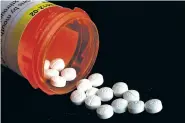  ?? ASSOCIATED PRESS FILE PHOTO ?? Newly released federal data shows how drugmakers and distributo­rs increased shipments of opioid painkiller­s across the U.S. as the nation’s addiction crisis accelerate­d from 2006 to 2012.