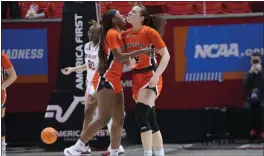  ?? RICK BOWMER — THE ASSOCIATED PRESS ?? Princeton guard Grace Stone, right, celebrates with Madison St. Rose after scoring a 3-pointer in the closing seconds against North Carolina State in a first-round game in the women’s NCAA Tournament on Friday in Salt Lake City.