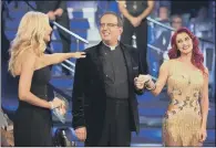  ?? PICTURES: GUY LEVY/BBC/PA WIRE. ?? DANCE DRAMA: Host Tess Daly, Rev Richard Coles and profession­al partner Dianne Buswell on Strictly.