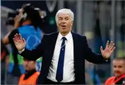  ?? AP ?? In this file photo, Atalanta coach Gian Piero Gasperini gives instructio­ns during the Champions League group C soccer match between Atalanta and Shakhtar Donetsk at the San Siro stadium in Milan, Italy. Gasperini says he had the coronaviru­s and was concerned for his life mid-march. Gasperini tells the Gazzetta dello Sport that he started feeling sick on March 9, a day before Atalanta played at Valencia in the second leg of the Champions League round of 16.