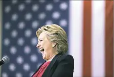  ?? Matt Rourke/Associated Press ?? Democratic presidenti­al candidate Hillary Clinton takes the stage at a campaign stop Tuesday at Wake Technical Community College in Raleigh, N.C.