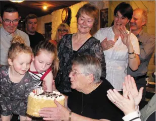  ?? Photograph: Breda McGaley ?? Conseil blowing out her candles with the help of grandniece­s Abbie McGaley and Eimear Thomas.