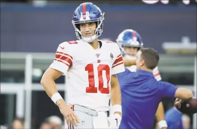  ?? Steven Senne / Associated Press ?? Giants quarterbac­k Eli Manning begins his 16th NFL season on Sunday when New York visits the Dallas Cowboys.