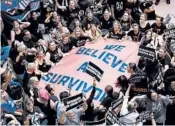  ?? MANUEL BALCE CENETA/AP ?? Kavanaugh protesters gather Thursday in the Hart Senate Office Building on Capitol Hill.