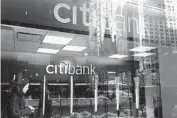  ?? MARK LENNIHAN AP FILE ?? The bureau found that Citi employees were trained to avoid approving certain credit card applicatio­ns.