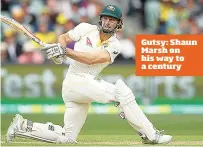  ??  ?? Gutsy: Shaun Marsh on his way to a century