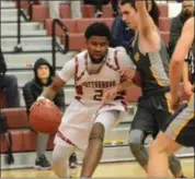  ?? THOMAS NASH - DIGITAL FIRST MEDIA ?? Pottsgrove’s Justin Robinson (2) drives along the baseline while Devon Prep’s Nick Crowe (1) and Eamonn Walsh (34) defend.