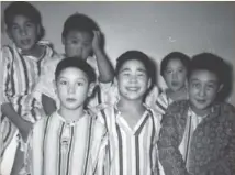  ?? ?? A group of unidentifi­ed boys at the Clearwater Lake Indian Hospital in Manitoba in 1964.