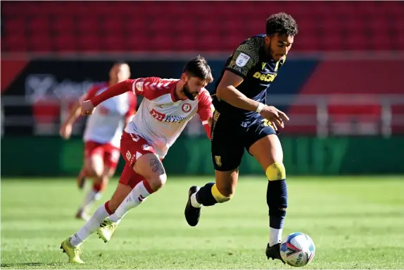  ??  ?? TOP PERFORMERS: Jacob Brown and Danny Batth, below, are playing key roles in the formation Michael O’neill is utilising.