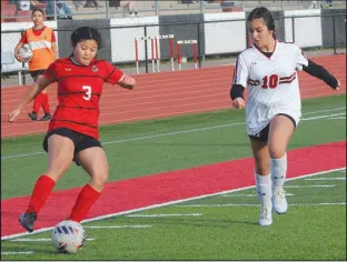  ?? Daniel Bereznicki/McDonald County Press ?? Eh Hser Moo (No.3) shows her ball-handling skills at the March 15 Soccer Jamboree against Aurora.