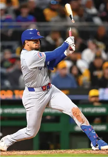  ?? GETTY IMAGES ?? The Cubs’ Christophe­r Morel breaks his bat on an RBI single in a four-run seventh inning Friday.