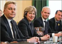  ?? GETTY IMAGES ?? Prime Minister Theresa May’s (center) expulsion of Russian diplomats from Britain could have a bigger effect on staffing than Barack Obama’s 2016 decision to expel 35 diplomats in response to alleged Russian meddling in the U.S. election.