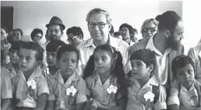  ?? (Ya’acov Sa’ar/GPO) ?? EDUCATION MINISTER Aharon Yadlin with first graders at the Eshkol School on the opening day of the school year, in Rosh Ha’ayin, September 1, 1976.